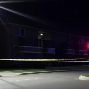 Police activity at Forest Park Apartments after a shooting incident.