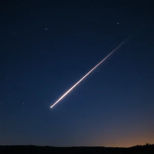 A bright meteor crossing the night sky of Tennessee during the Orionid meteor shower.