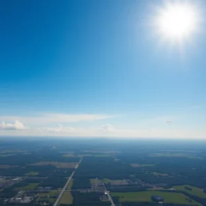 Scenic view of Nashville skydiving area with parachutes in the sky.