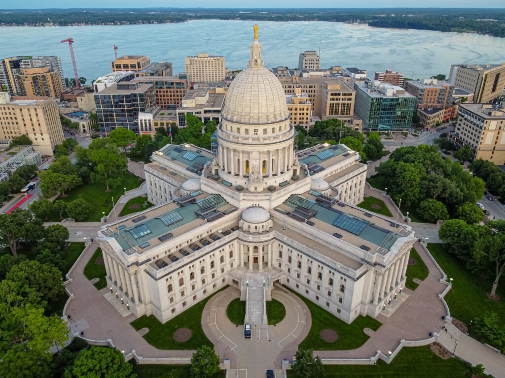 State capitol building dome against blue sky