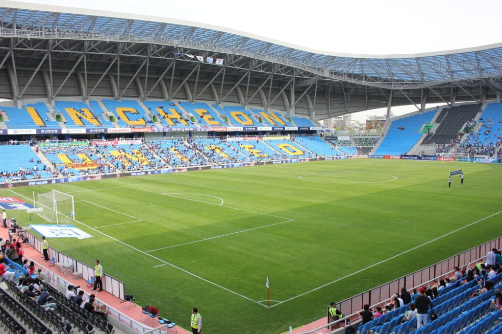 Pro soccer stadium with a green field