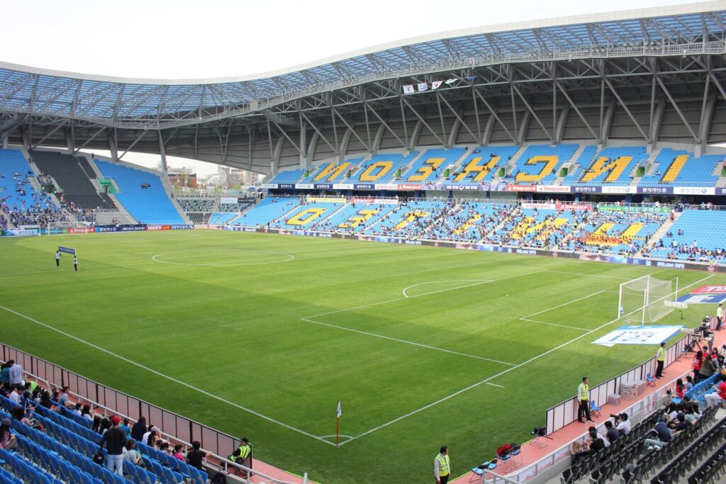 Soccer stadium with pitch and stands