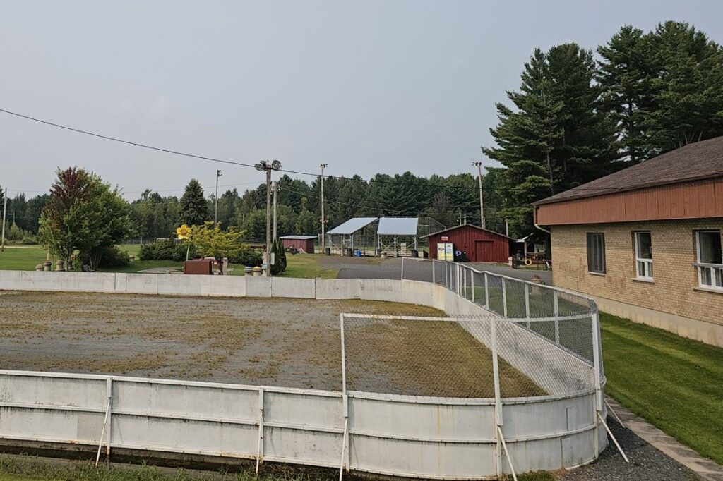 Outdoor hockey rink with boards